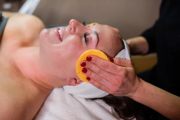 Patient getting a wax treatment