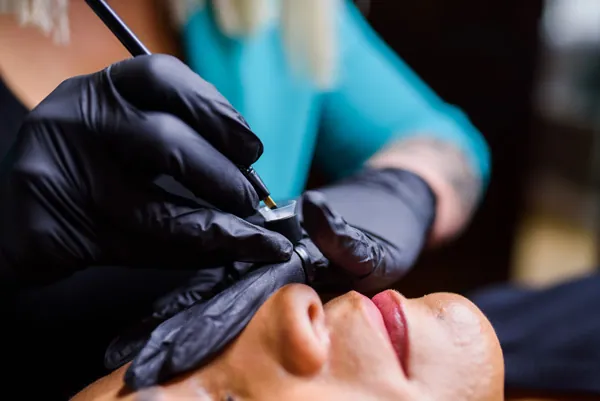 A patient undergoing microblading treatment